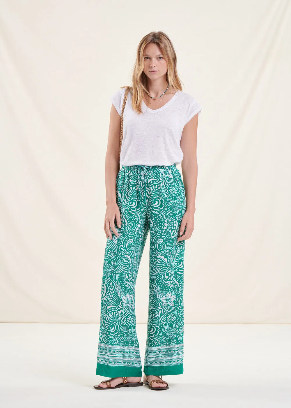 Pantalon fluide vert taille élastique à fleurs